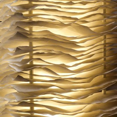 Close-up of a textured yoga mat with soft ambient light.