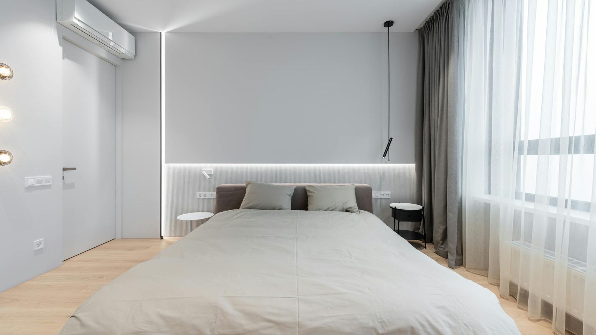 Minimalist and spacious room for movement practice with soft light.