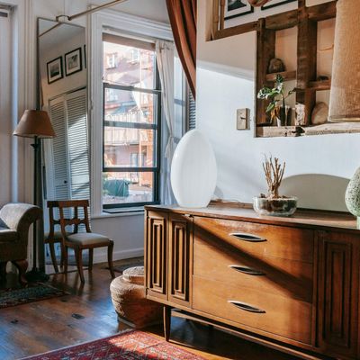 Sunlight streaming through a window onto a wooden floor.